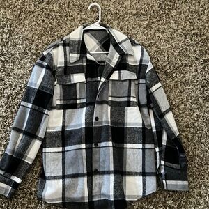 Fleece, flannel button up shirt.